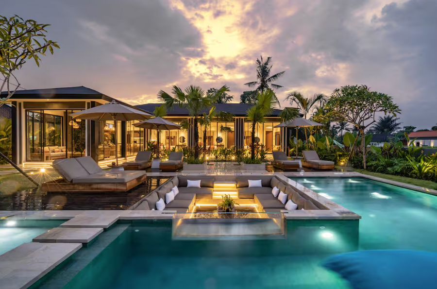 Group of stylish travelers living it up in South Africa, proving luxury doesn’t have to cost a fortune